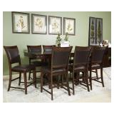 Ashleuy 564 counter height table and 6 barstools