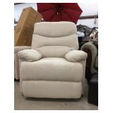 Tan press back recliner