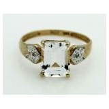 10kt Gold Emerald Cut White Topaz Solitaire Ring