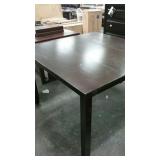 Dark brown wood dining table