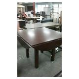 Wood round table with drop sides to convert to