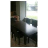 Dark brown Whalen dining table with 6 chairs