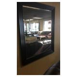 Large black wall mirror