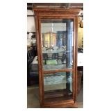 Howard Miller Oak Curio Cabinet