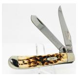 Case XX Amber Bone Papaw Mini Trapper
