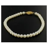 14kt Gold Genuine 5-5.4 mm 7" Pearl Bracelet