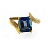 10kt Gold Emerald Cut London Blue Topaz Solitaire