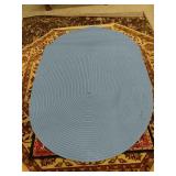Blue oval rug