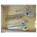 Adjustable wrenches