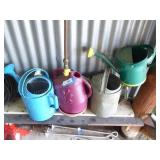 4 watering cans