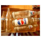 5 Pepsi bottles