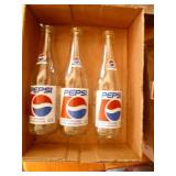 3 Pepsi bottles