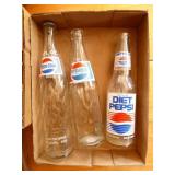 3 Pepsi bottles
