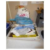 4 boxes: tablecloths, fabric, towels, misc.