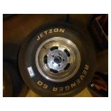 Two 60" bias-ply tires w/ 14" mag rims