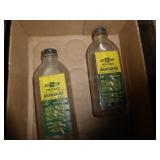 2 vintage Chevrolet Wash Cream bottles