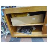 2 shelves: pillows - pictures - tin signs 2 shelves: pillows - pictures - tin signs