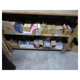 2 shelves: casters & misc. 2 shelves: casters & misc.
