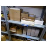2 shelves: hang tags, zip bags, misc. 2 shelves: hang tags, zip bags, misc.