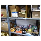 2 shelves of office supplies: pens - tape - clips 2 shelves of office supplies: pens - tape - clips