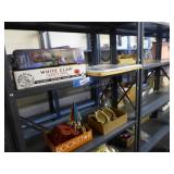 2 shelves: Thermoses - 1976 calendar - iron toy (A 2 shelves: Thermoses - 1976 calendar - iron toy (A