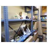 Shelving unit of knick knacks - mostly figurines Shelving unit of knick knacks - mostly figurines