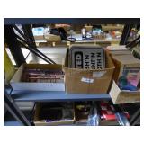 Shelf of humorous signs, booklets, etc. Shelf of humorous signs, booklets, etc.