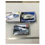 3 Model Kits- 2 AMT and 1 Revell