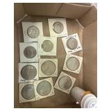 6 Dollar Pieces, 5 50 cent and 15 Quarters most