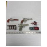 Toy Pistols, Truck and Dolly