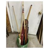 Pool sticks and assorted pool table items