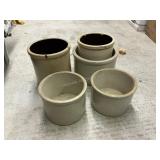 5 clay pots and picther