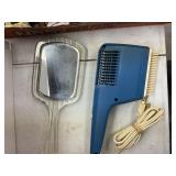 Box with 2 irons and  hair styler