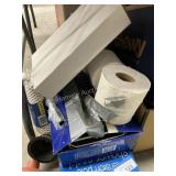 Bathroom items- racks, light fixture, toilet