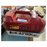 Fuel tank with storage container