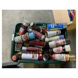 Basket full of assorted paints and spray foam