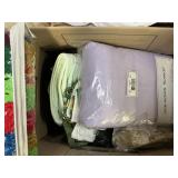 Box of assorted blankets and towels
