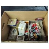Box of Christmas ornaments and decor