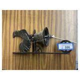 Chicken bell and dog statue