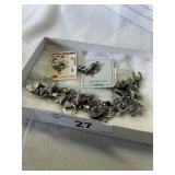 Unmarked silver tone bracelet with some sterling