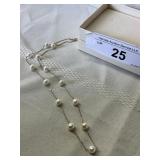 Pearl necklace marked 10k - approximately 5 grams