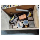 Box with horseshoes, hardware and tools