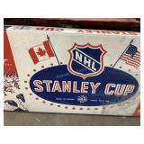 Stanley Cup hockey game ( in two boxes)