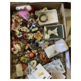 Flat of costume jewelry pins