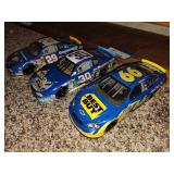 3 die cast cars