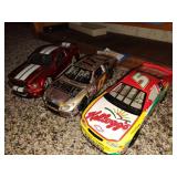 3 die cast cars