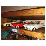 3 die cast cars
