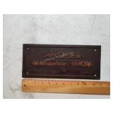 Historical cast iron sign