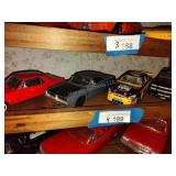 3 die cast cars