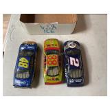 3 Die cast metal racing cars